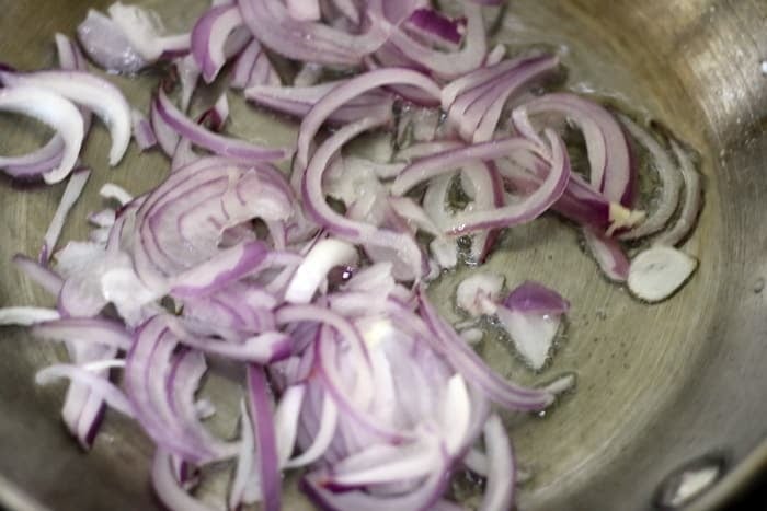 frying onions in oil.