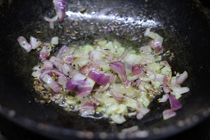 sauteing onions for aloo paneer