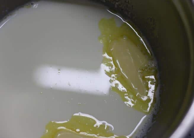 Mixing butter with milk for eggless pancakes recipe