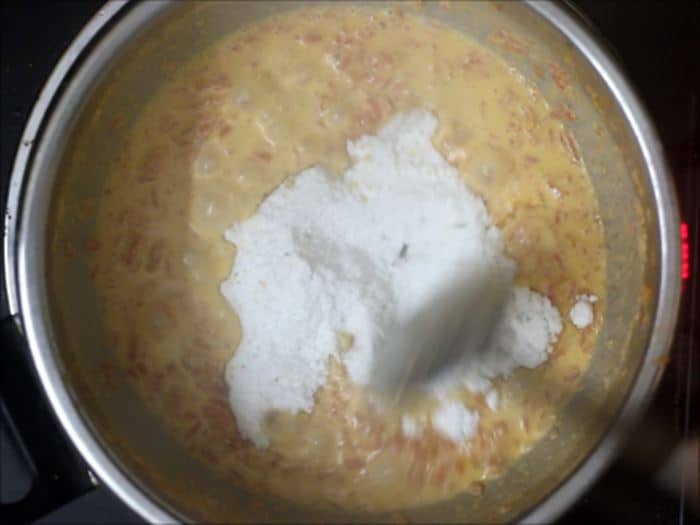 powdered sugar added to cooked carrots for making halwa