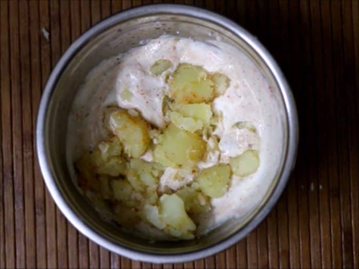 add boiled potatoes for aloo raita