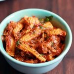 baby corn masala recipe- tasty baby corn masala curry served in a green bowl with roti