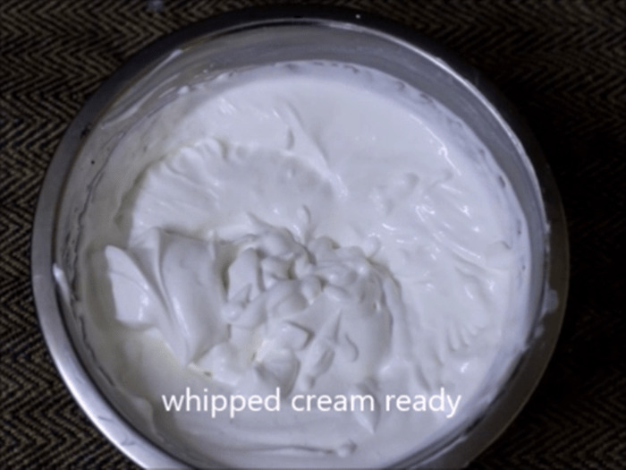 Cream whipped until soft peaks are formed.