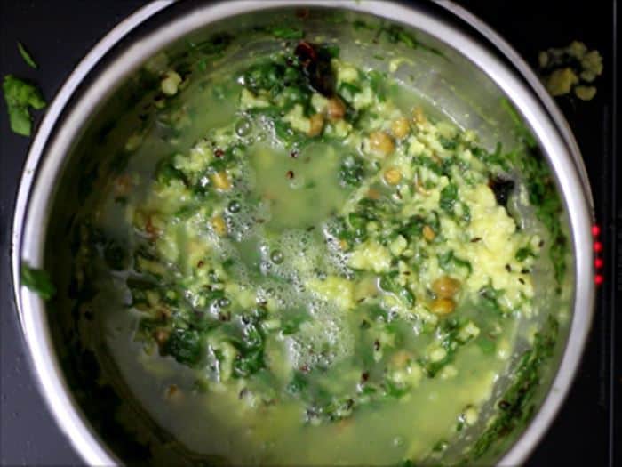 Adding cooked lentils for palak dal recipe