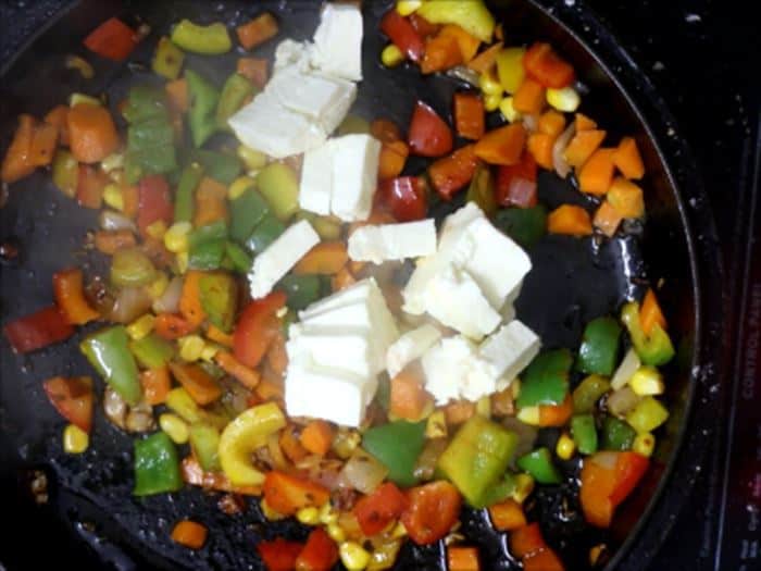 Adding paneer to the cooked veggies-paneer fry recipe