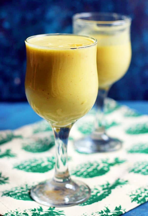 virgin pina colada drink served in two tall glasses