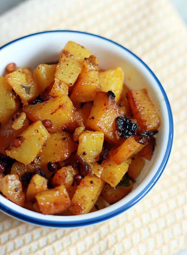 Warm potato poriyal served as side dish