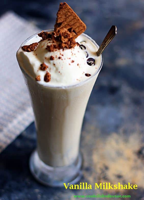 vanilla milkshake recipe- best homemade vanilla milkshake with ice cream,garnished with crushed cookies and chocolate chips.