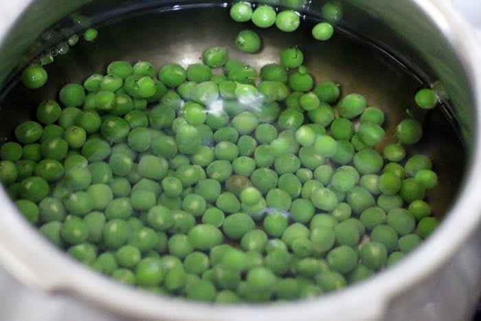 green peas added to boiling water