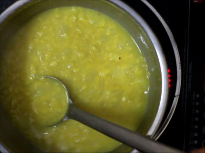 cooked lentils and raw mango for mango dal recipe