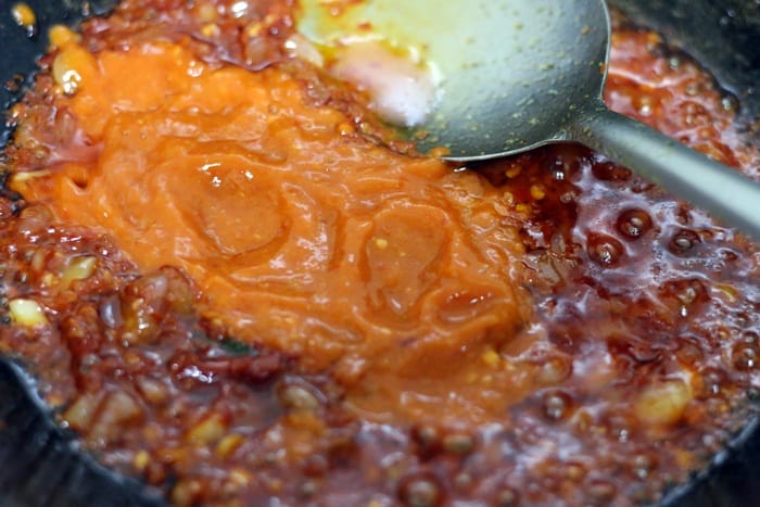 tomato paste added to sauce.