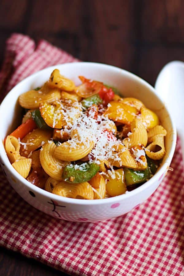 vegetable pasta recipe made with whole wheat pasta,mixed vegges and cheese served for dinner