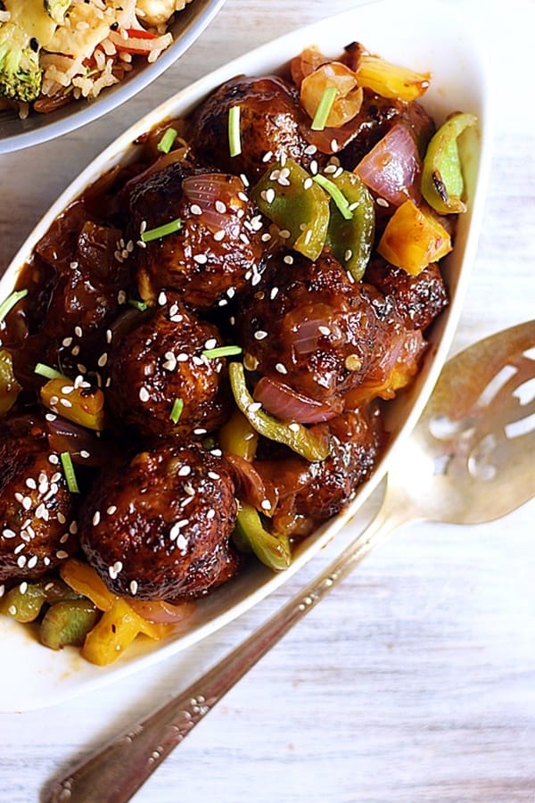 crispy manchurian with mixed vegetable served in a white ceramic bowl