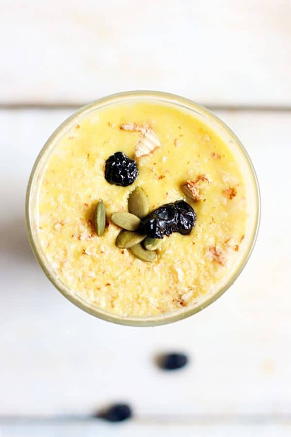 Overhead shot of healthy and tasty banana mango smoothie recipe