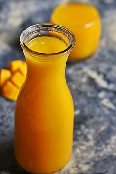 Making Homemade mango frooti recipe