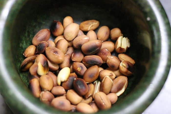 Mung bean salad making-dry roasted peanuts for crunch