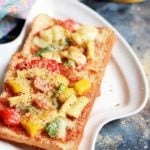 pizza toast recipe-pizza toast served on a white plate