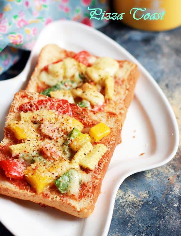 pizza toast recipe-pizza toast served on a white plate