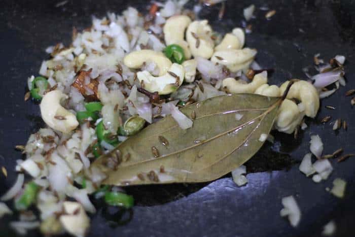 sauteing onions in ghee for jeera rice