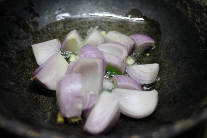 sauteing onions to make paneer kalimirch 
