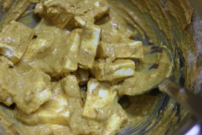 paneer marinating in spices for making paneer tikka sandwich recipe