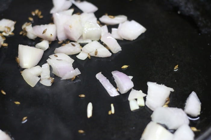 sauteing onions for paneer tikka sandwich filling