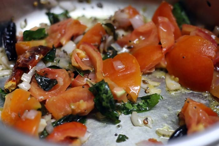 sauteing tomatoes forarisi paruppu sadham recipe
