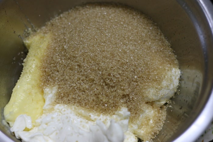 mixing wet ingredients for making cream cheese cake recipe