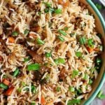 Easy best fried rice served in a enamel green bowl