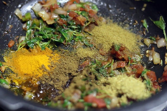 Adding spice powders to paneer filling for making paneer dosa 