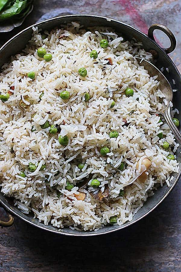flavorful peas pulao or matar pulao served in a copper pan