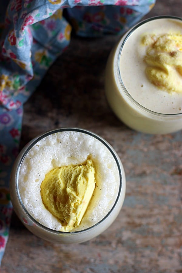 overhead shot of creamy and rich badam sake or almond milkshake