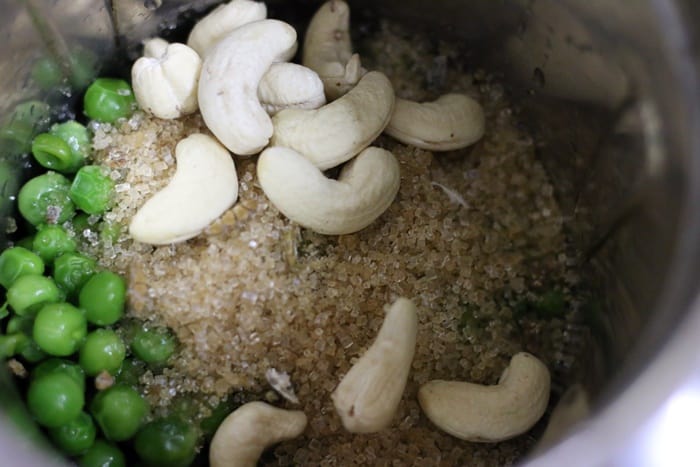 Blending peas, sugar and cashews for matar ki kheer