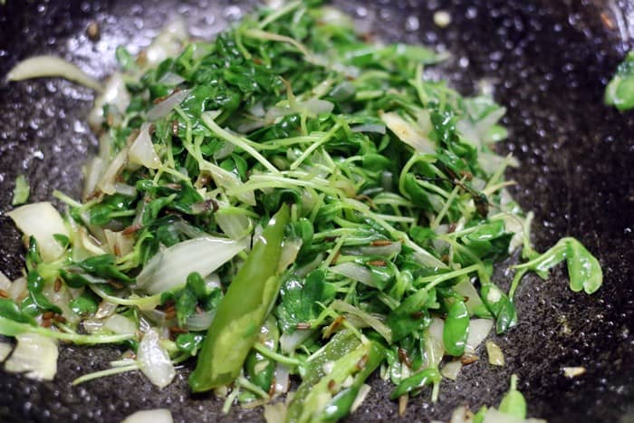 sauteing methi leaves for aloo methi