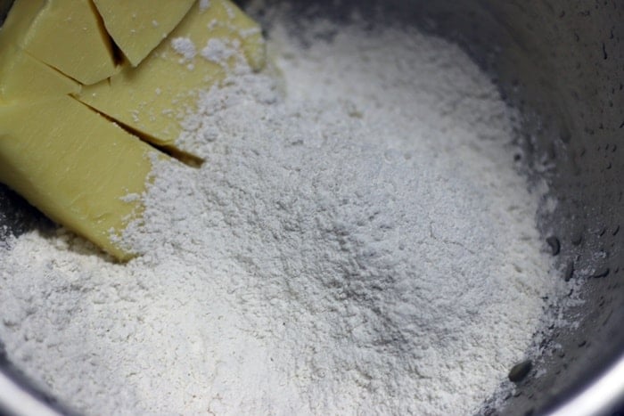 Icing sugar and butter in a large bowl for creaming.