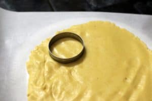 dough rolled out for making custard creams