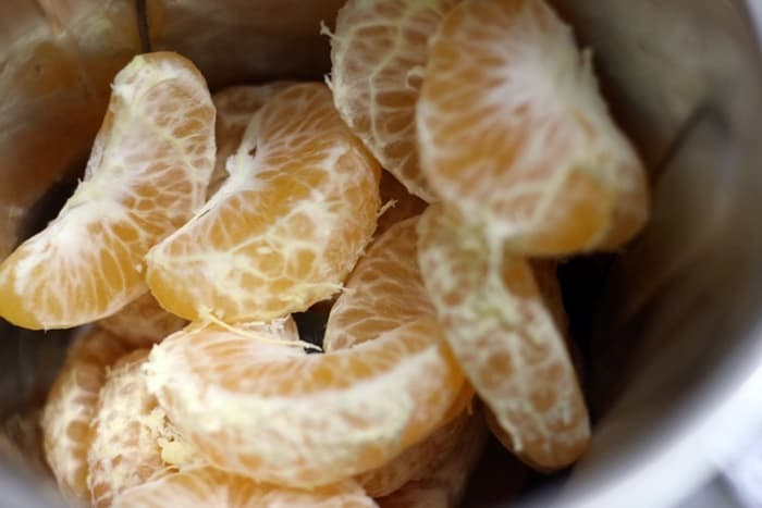peeled and segmented orange for ganga jamuna juice