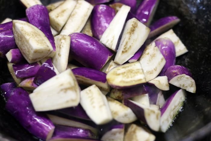 Brinjal added to tempering for making brinjal fry recipe