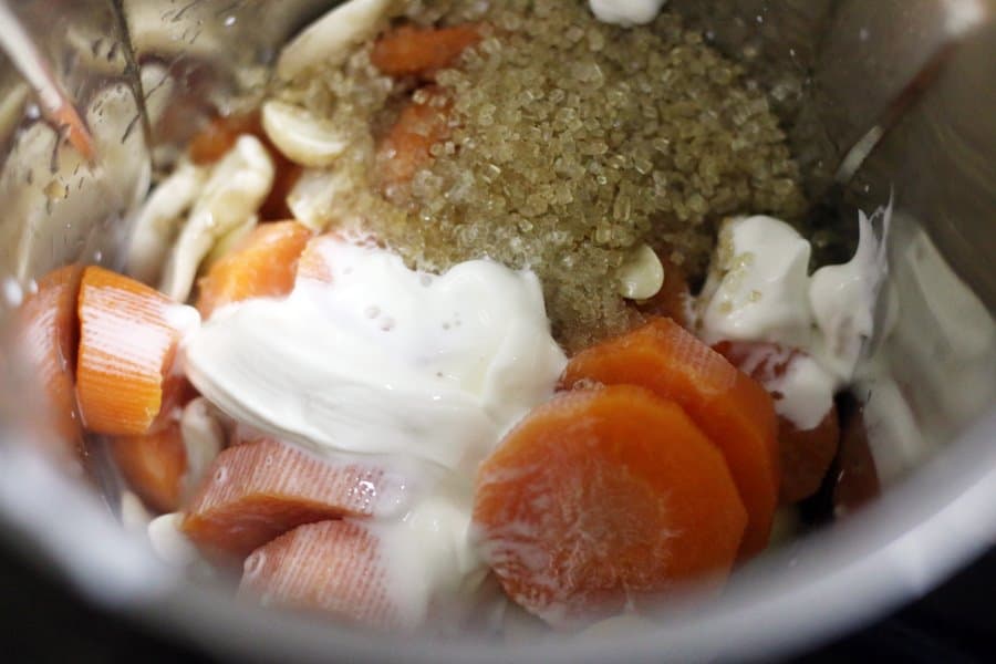 carrots,cream, cashews and sugar added in a blender jar