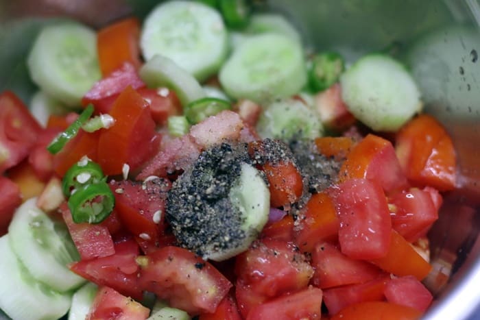 Making cucumber tomato salad