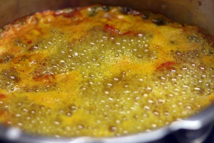 Rolling boil water for dal dhokli recipe