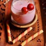 Rooh Afza Milkshake served in a wooden tray
