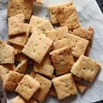 Freshly baked pizza crackers served as snack with tea