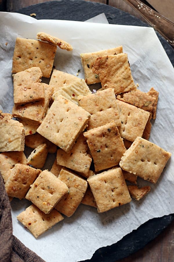 Freshly baked pizza crackers served as snack with tea