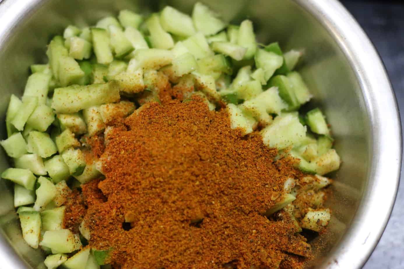 pickling spices added to raw mangoes