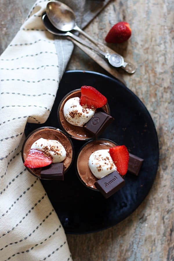 overhead shot of eggless easy chocolate mousse served in small glasses