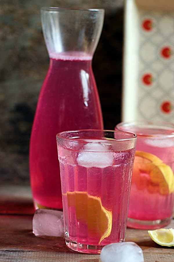 Chilled rose lemonade served with lemon slices