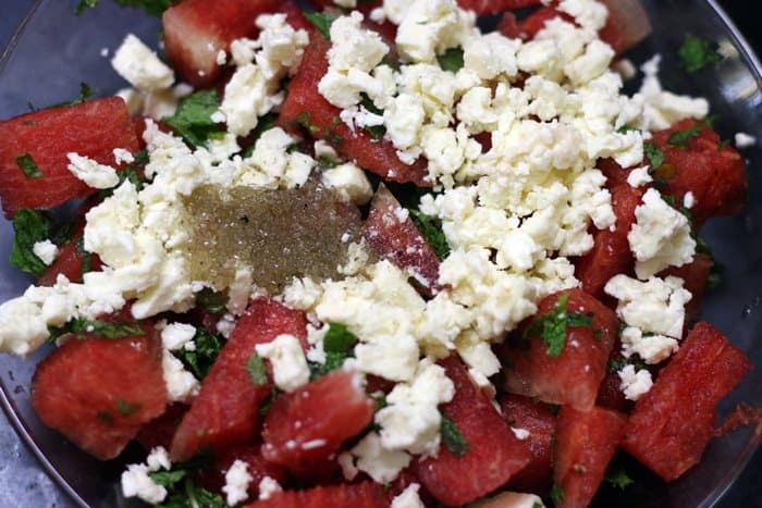 Making watermelon salad recipe