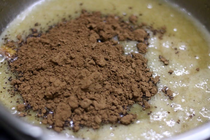 cocoa powder added to melted butter