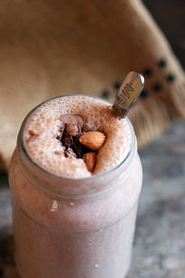 Closeup shot of thick sharjah shake served in glass bottle